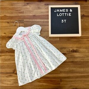 James & Lottie White & Pink
Ruffle Christmas Bells Dress
3T Short Sleeve Preppy